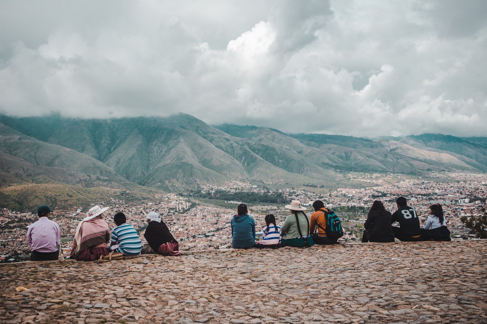 locals watching views from cristo de la concordia jesus statue in cochabamba bolivia