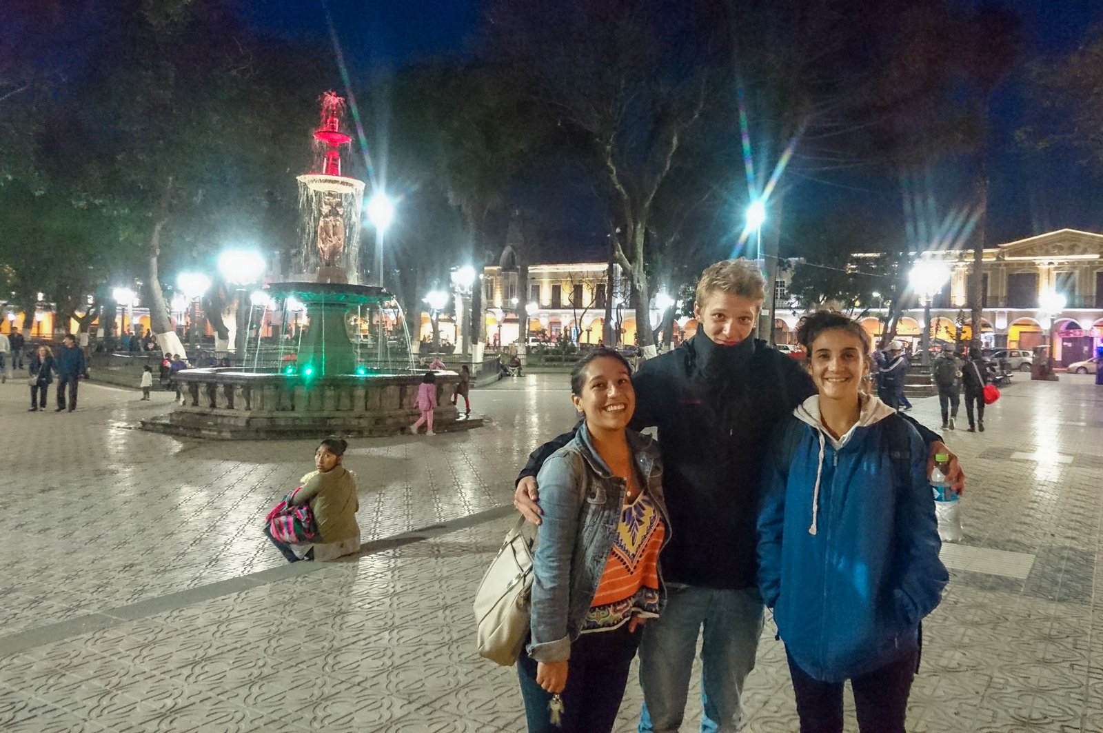 Fountain lit up in bolivian flag colours in Plaza 14 de Septiembre cochabamba bolivia