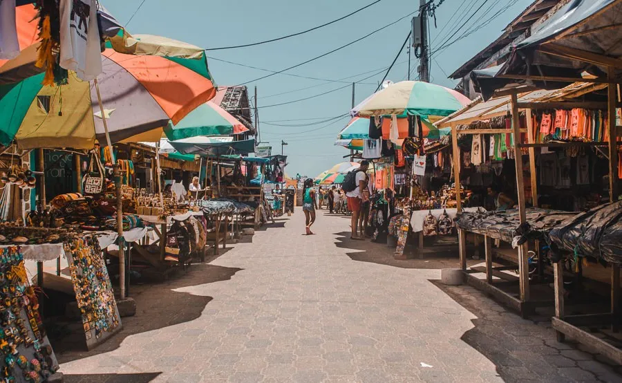 Rows of street stalls with souvenirs in Montañita Ecuador