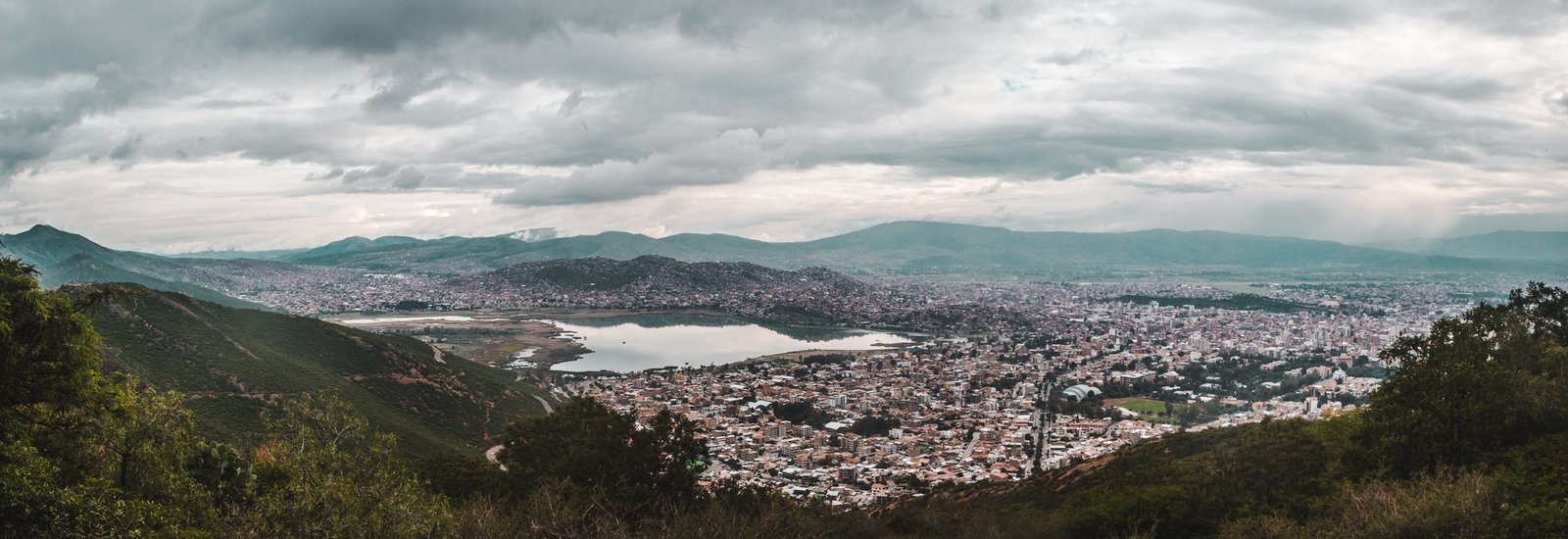 views from cristo de la concordia jesus statue in cochabamba bolivia alalay lagoon
