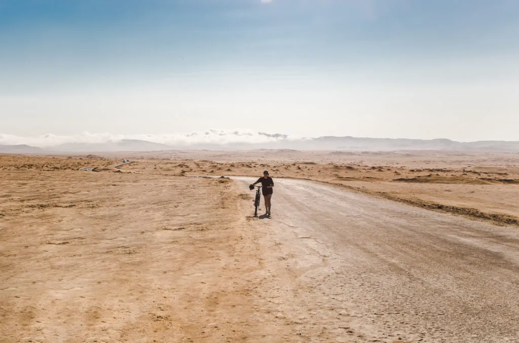 cycling the desert to the red beach of paracas national park, peru