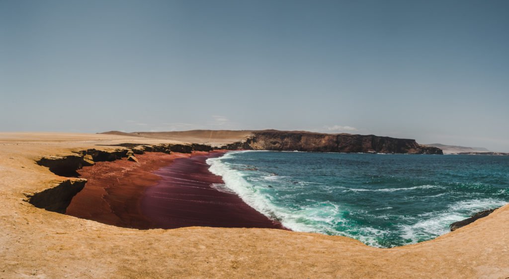 cycling the desert to the red beach of paracas national park, peru