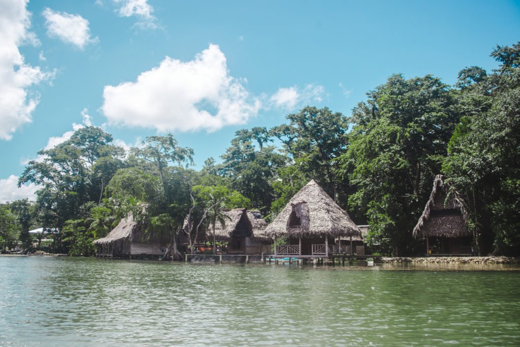 stilted huts on rio dulce: 2 weeks in guatemala itinerary