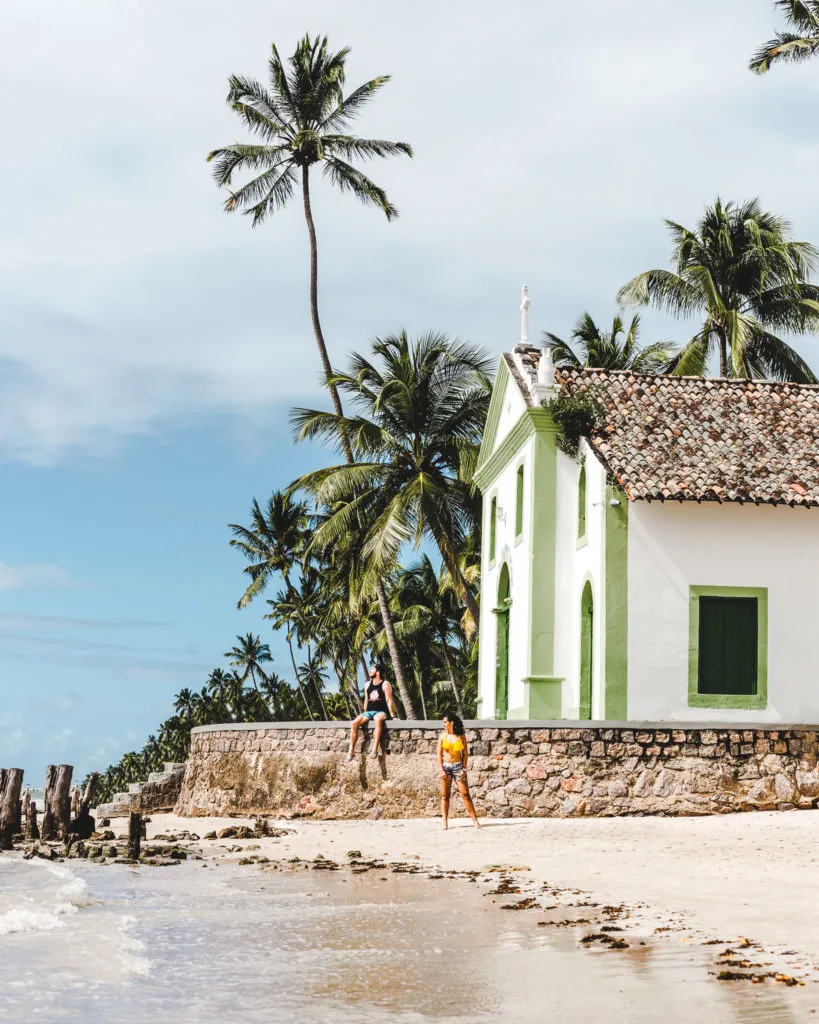Church on the beach Brazil | Guide to Maragogi vs Porto de Galinhas alternative, Brazil | Praia dos Carneiros tour review travel couple