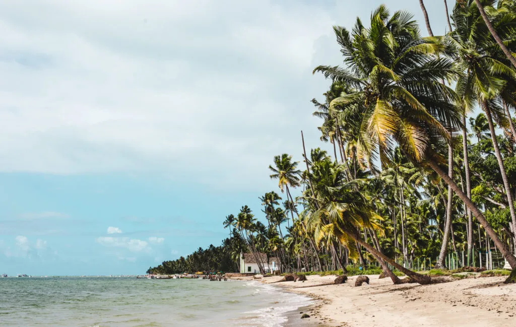Church on the beach Brazil | Guide to Maragogi vs Porto de Galinhas alternative, Brazil | Praia dos Carneiros tour review travel couple