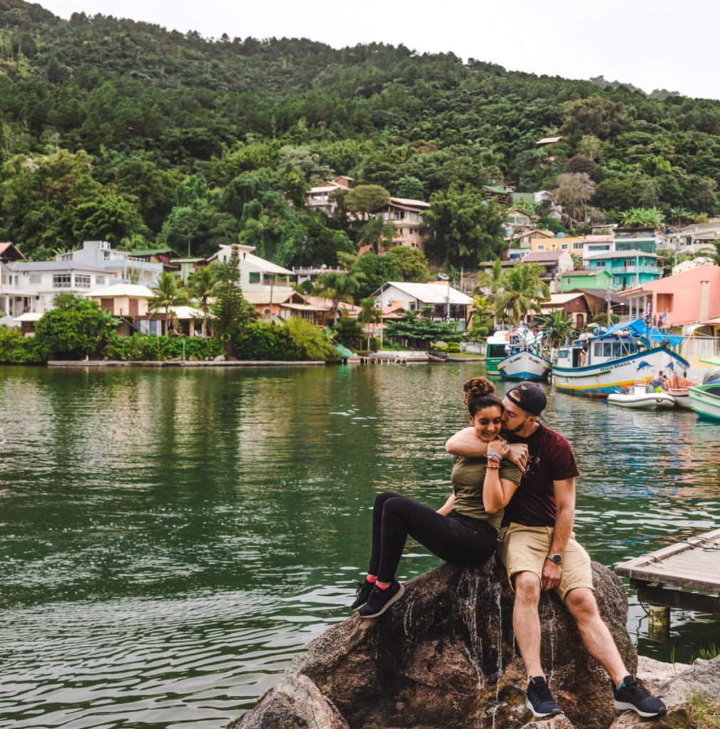 Travel couple at Barra da Lagoa Florianopolis travel guide floripa brazil