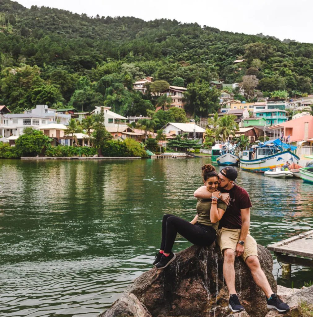 Travel couple at Barra da Lagoa Florianopolis travel guide floripa brazil