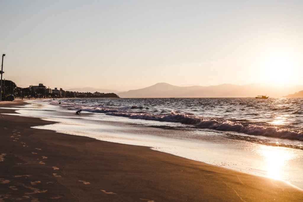 Sunset on Praia Canasvieiras beach Florianopolis travel guide floripa brazil where to stay in florianopolis