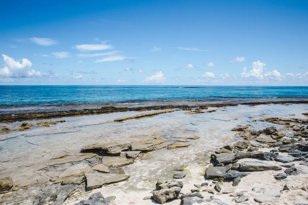 Rocks on busy Johnny Cay San Andres Colombia | VIP boat tour island travel guide