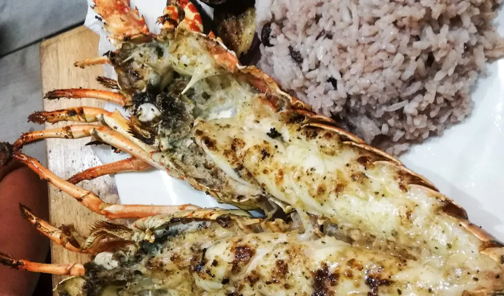 where to eat Caye Caulker Belize island grilled lobster on the street Oscar Da Crusted Crab restaurant curry