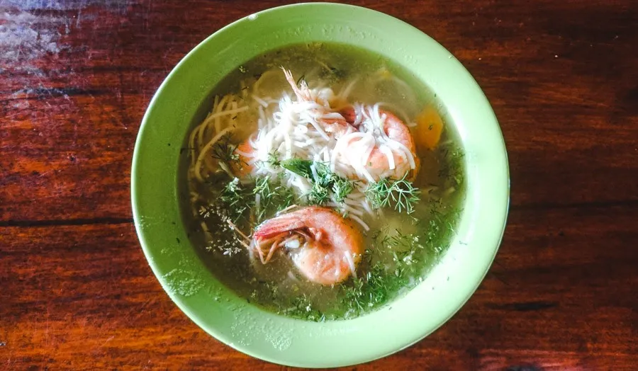 prawn soup served in a bowl in ayampe, a day trip from montañita ecuador