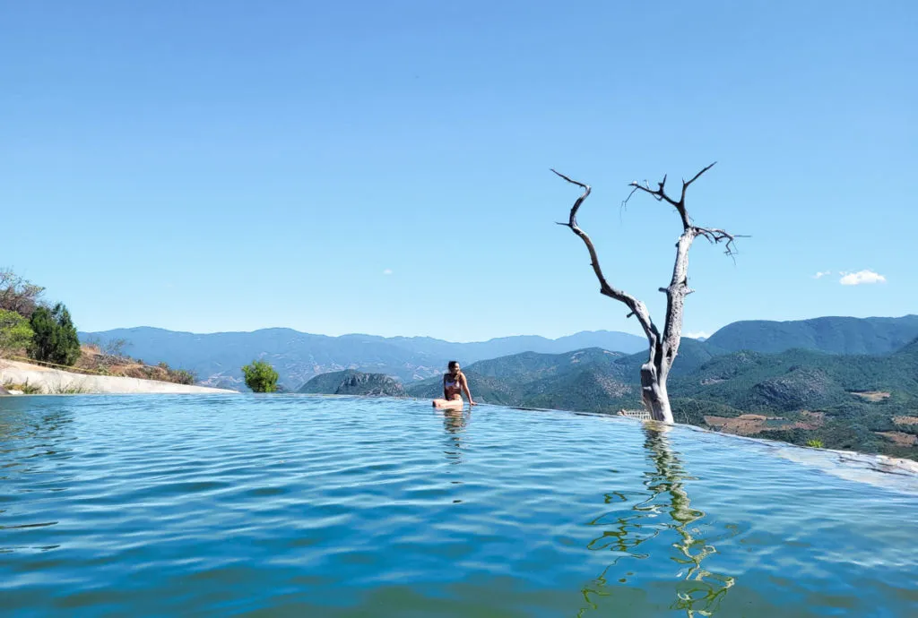 swimming in natural pools - how to get to Hierve el Agua from Oaxaca Mexico (with or without a tour)
