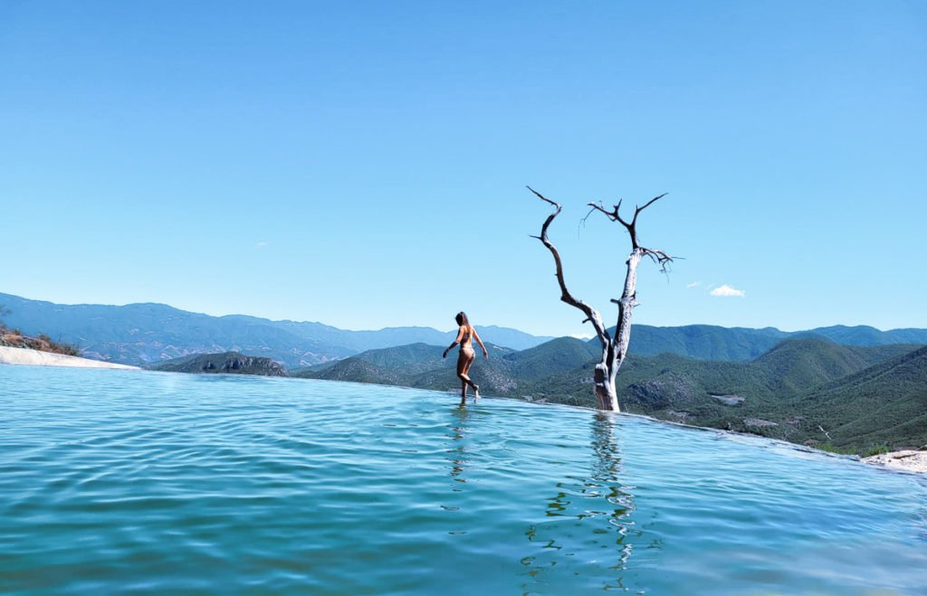 swimming in natural pools - how to get to Hierve el Agua from Oaxaca Mexico (with or without a tour)