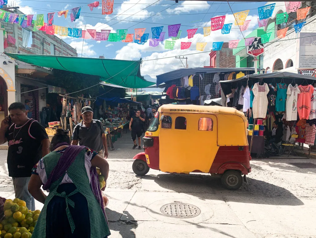 tuktuk in tlacolula market on sunday - oaxaca day trips